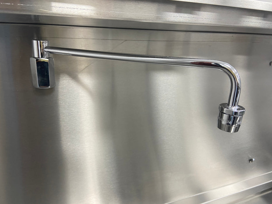 Wok tap connected to stainless steel